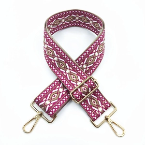Ethnic style pink jacquard bag strap with geometric patterns and golden metal clasps
