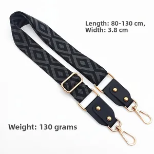 Bandoulière jacquard ajustable avec motif losanges et attaches métalliques dorées