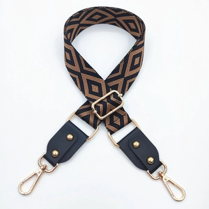 Bandoulière jacquard réglable avec boucles dorées et motifs géométriques ethniques