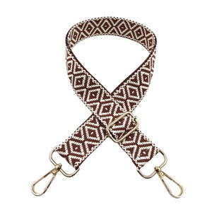 Adjustable brown and white geometric jacquard canvas bag strap with gold metal buckles