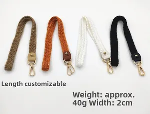 Detail of 2cm wide knitted bag straps in four colors with golden lobster clasps and leather