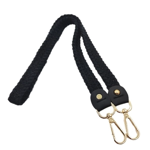 Knitted wool shoulder strap for bags with gold metal clasps and black leather accents