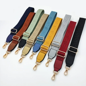 Adjustable woven replacement bag straps with Greek key patterns and gold metal buckles