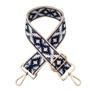 Ethnic style woven wide shoulder strap with blue geometric patterns and gold metal clips