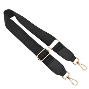 Adjustable black replacement bag strap with Greek Key pattern and gold hardware