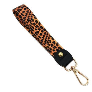 Leopard print wristlet strap with golden lobster clasp for handbags and keychains
