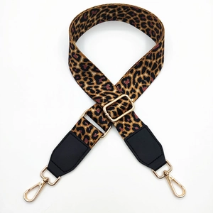 Adjustable leopard print bag strap with golden metal hooks and black leather ends