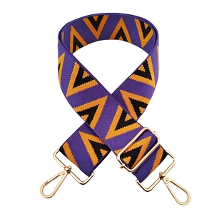Adjustable purple jacquard wide strap with yellow geometric pattern and gold hooks