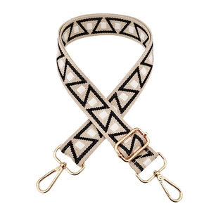 Adjustable wide woven shoulder strap with black geometric pattern and gold hardware