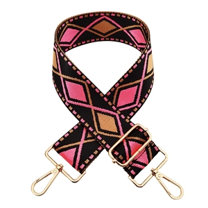 Adjustable woven shoulder strap with pink and gold star patterns and gold hooks