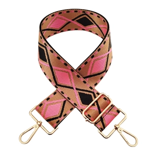 Adjustable wide replacement bag strap with pink star patterns and gold hooks