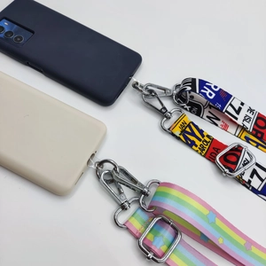 Macro shot of phone case sets with patterned lanyards and metal adjustment buckles