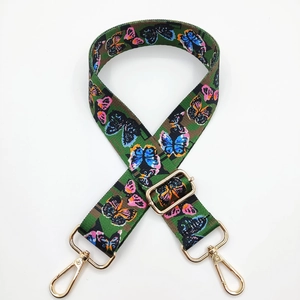 Adjustable camouflage shoulder strap with colorful butterfly patterns and gold hooks