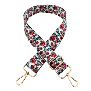 Adjustable wide replacement bag strap with red and green tropical floral pattern