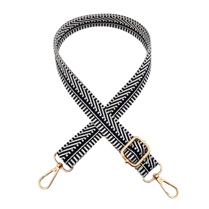 Adjustable black and white herringbone shoulder strap with gold metal swivel lobster clasps