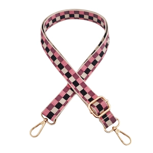Pink and black checkered adjustable crossbody bag strap with gold metal lobster clasps