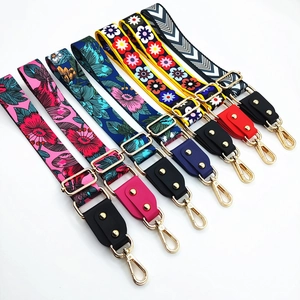 Adjustable crossbody bag straps with floral heat transfer patterns and gold hooks