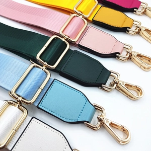 Adjustable nylon shoulder strap with colorful wide webbing and gold metal lobster clasps