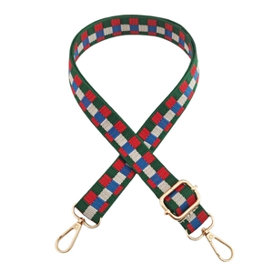Adjustable 2.5cm wide dark green crossbody strap with red blue geometric jacquard pattern