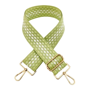 Adjustable light green and white diamond pattern woven shoulder strap with gold metal clips