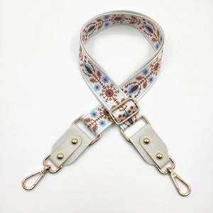 Adjustable wide shoulder strap with ethnic embroidery and gold metal lobster clasps