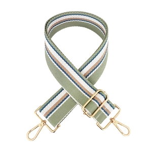 Adjustable wide striped fabric bag strap in sage green with golden metal hooks