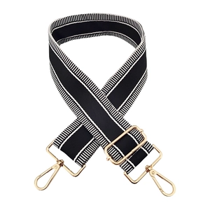 Adjustable black and white vertical striped 5cm wide shoulder strap with gold metal hooks