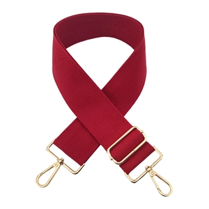 Adjustable burgundy canvas shoulder strap with gold swivel hooks for handbags