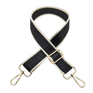3.8cm wide adjustable bag strap with black and white Greek Key pattern and gold hardware