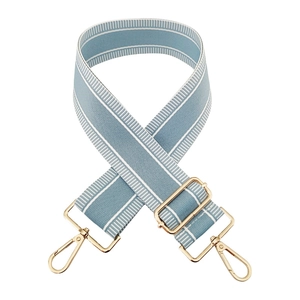Detail of adjustable blue and white striped fabric strap with gold metal lobster clasps