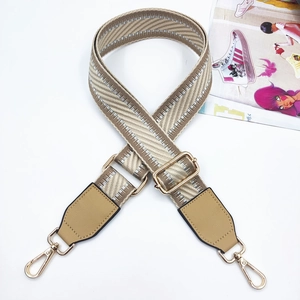 Adjustable beige and silver woven crossbody strap with gold metal hooks for women handbags