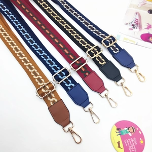 Detailed view of adjustable wide woven bag straps in five colors with golden metal hooks