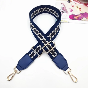 Adjustable navy blue geometric woven shoulder strap with gold metal buckles for handbags