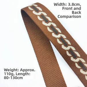 Detail of 3.8cm wide woven bag strap with geometric chain patterns and 130cm adjustable length