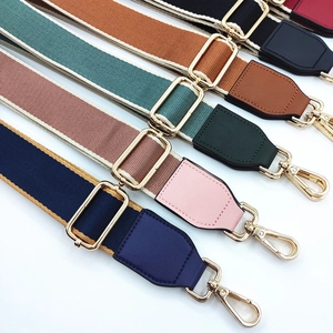 Adjustable solid color wide shoulder strap for bags with gold metal hooks and colorful webbing