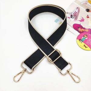 Adjustable black and white woven shoulder strap with premium gold metal hardware hooks