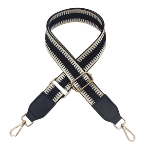 Adjustable wide replacement bag strap with silver gold wave pattern and gold metal hooks