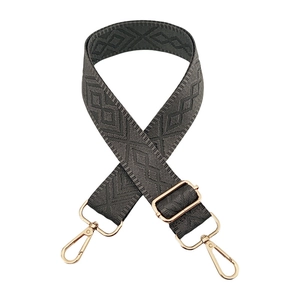 Close-up of a 3.8cm wide dark grey rhombus pattern woven strap with gold metal hooks