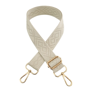 Detail of adjustable off-white woven shoulder strap with gold-tone swivel lobster hooks