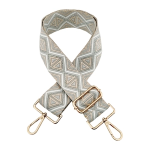 Adjustable wide woven bag strap with grey diamond jacquard pattern and gold metal hooks