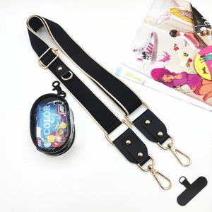 Adjustable wide canvas shoulder strap with gold hardware and small zipper coin pouch