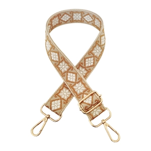 Adjustable wide woven shoulder strap with beige and camel geometric diamond patterns
