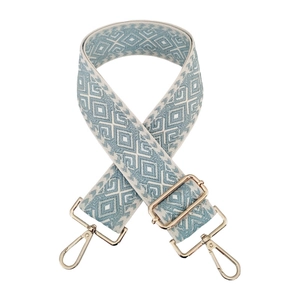 Detail of 5cm jacquard diamond pattern bag strap with light gold metal lobster clasps