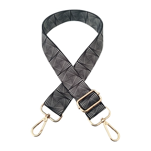 Adjustable wide replacement bag strap with black and white geometric spiral pattern