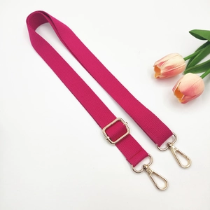 Adjustable rose purple woven strap with gold metal hardware for crossbody bags