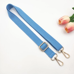 Sky blue cotton replacement bag strap with light gold metal swivel hooks and buckles
