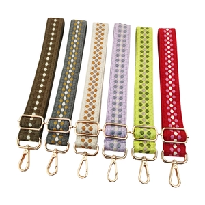 Adjustable colorful woven bag straps with gold metal hooks in six vibrant patterns