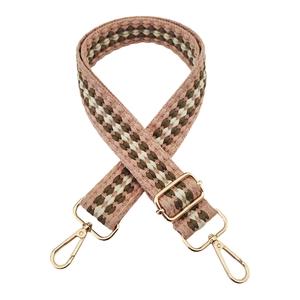 Close-up of geometric wave woven bag strap with golden metal lobster clasps and adjuster