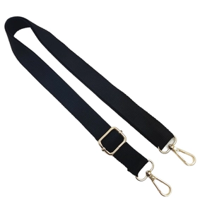 Adjustable black canvas bag strap with gold metal hardware for crossbody handbags