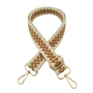 Detail of adjustable woven plaid strap with gold metal hooks for cross-body bags